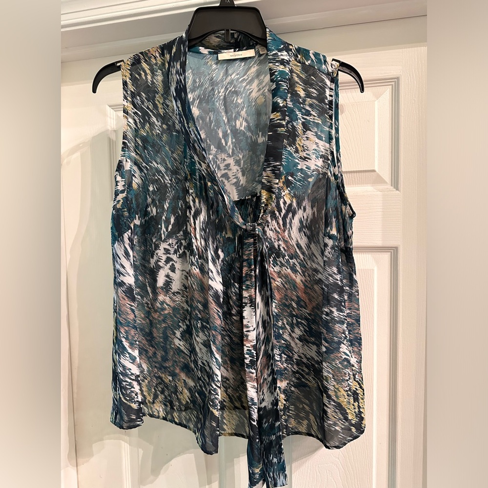 Sleeveless chiffon tie neck blouse